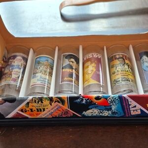 Brand new box of 6 ELVIS PRESLEY, two oz. shooters, four inch shot glasses.